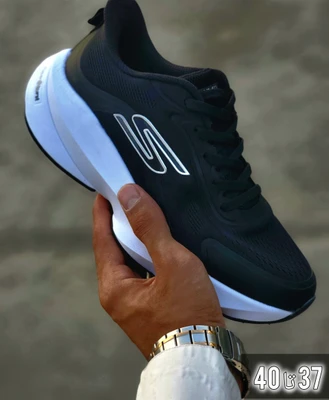 1783497820_4066254002 کتونی اسکیچرز مشکی سفید سایز 37 تا 40 SKECHERS - تصویر 1